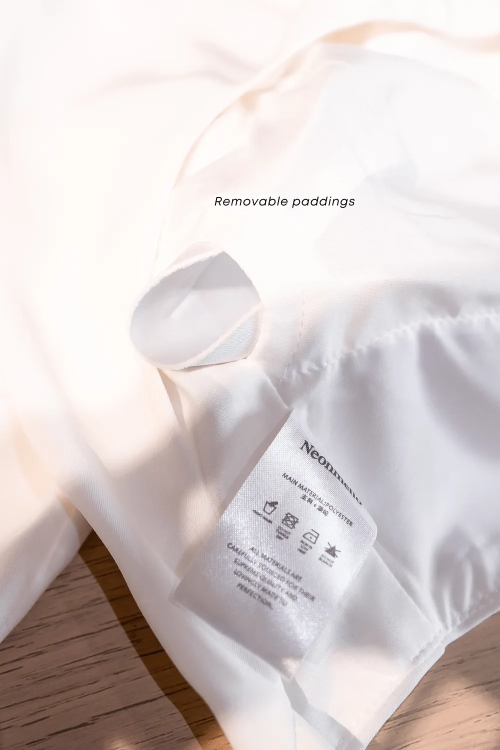 CREST PADDED TIE-BACK SLEEVE TOP IN WHITE