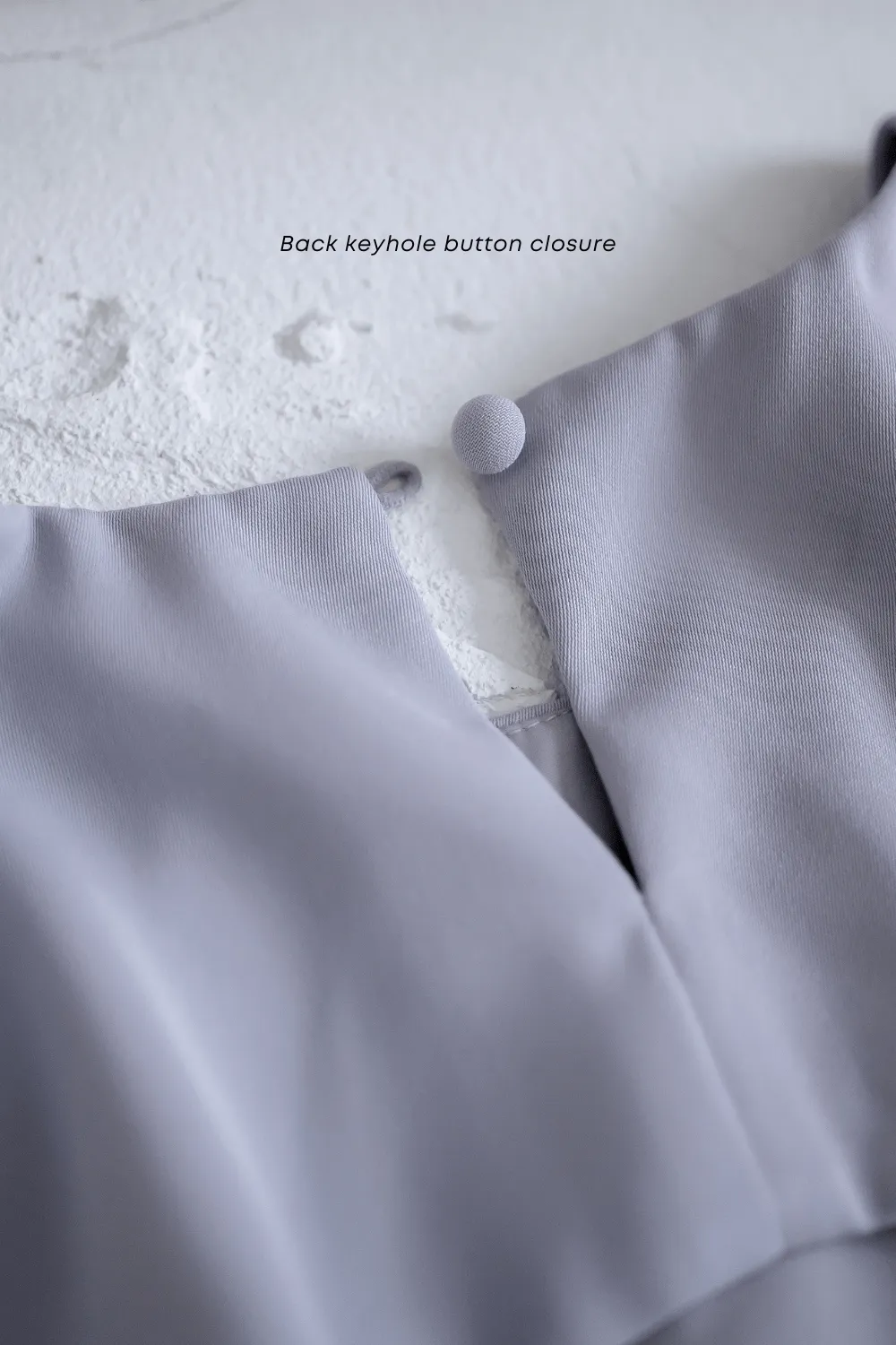 CREST PADDED TIE-BACK SLEEVE TOP IN WHITE
